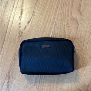 Tumi for Delta small black bag